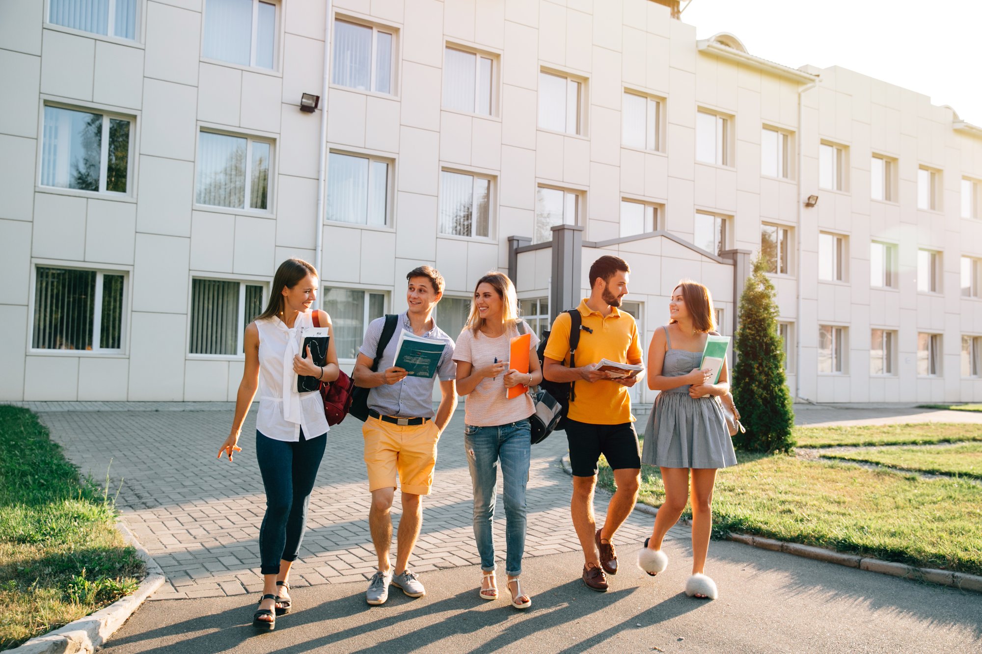 free-time-students-bachelor-s-campus-life-rhythm-five-friendly-students-are-walking